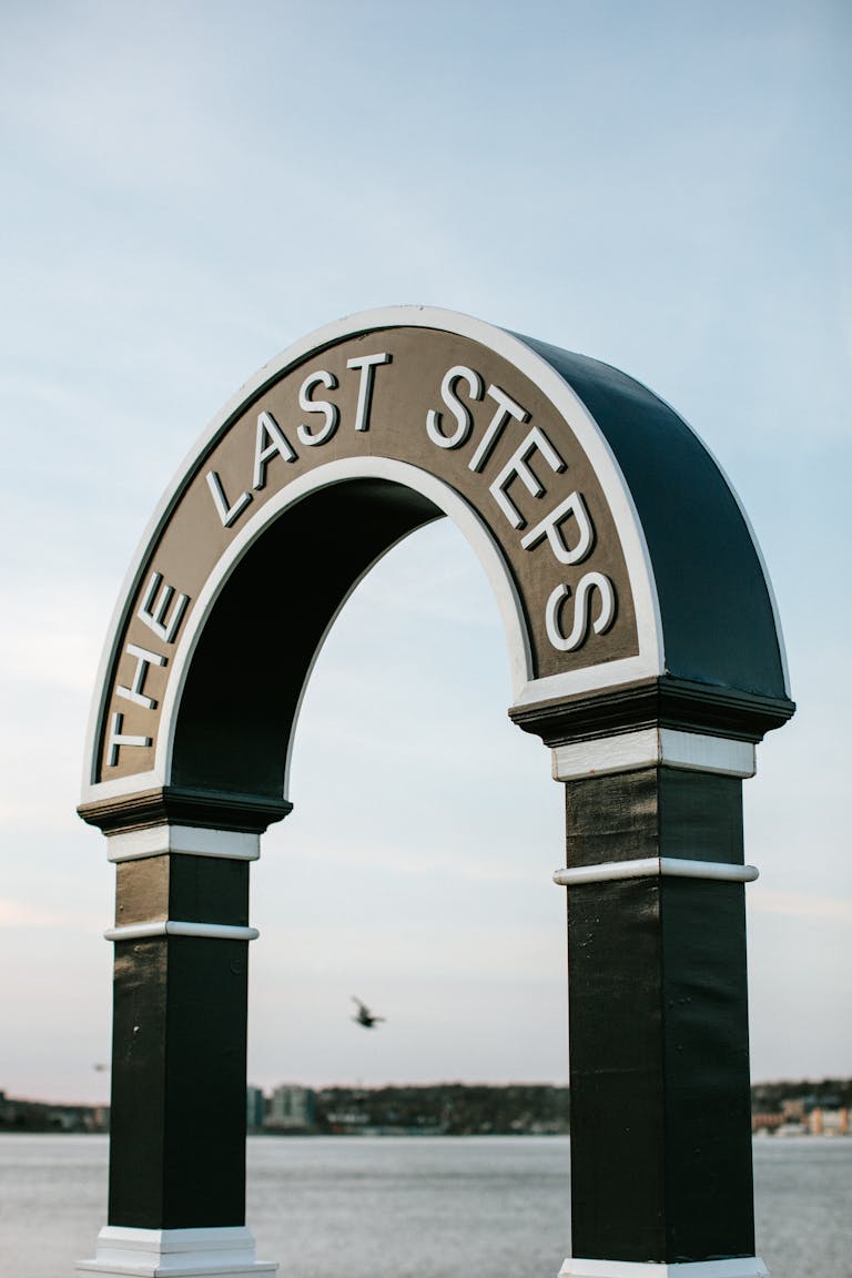 Iconic Nova Scola Last Steps Arch in Halifax, NS, Canada, overlooking the harbor.