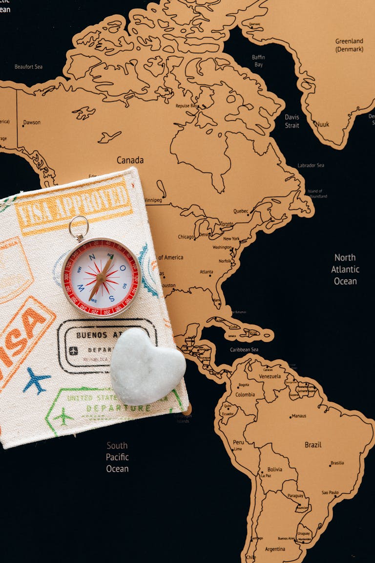 butterfliesnkisses onlyfans Flat lay photo of a map, passport, and compass, symbolizing travel and adventure.