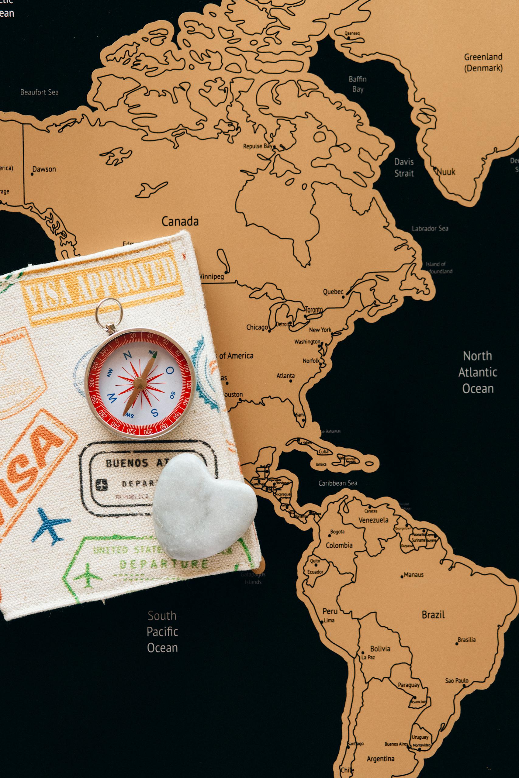 butterfliesnkisses onlyfans Flat lay photo of a map, passport, and compass, symbolizing travel and adventure.