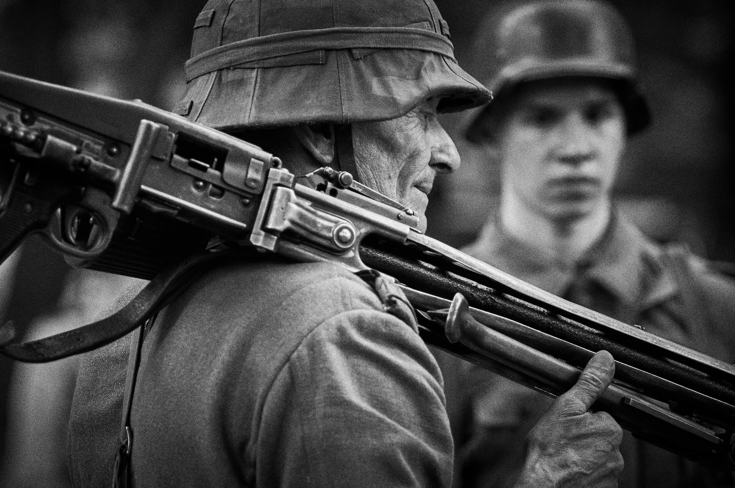 World War 1 World War 1 Black and white photo of soldiers with rifles in historical attire.