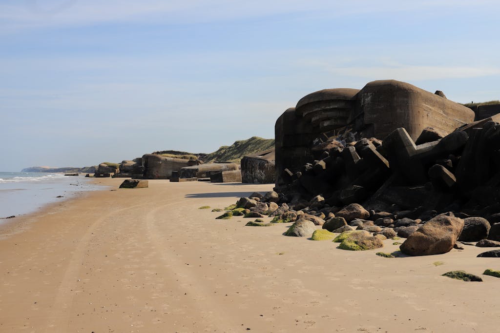 World War 2 Log: World War II bunkers on Løkken Beach in Denmark along the North Sea coast.