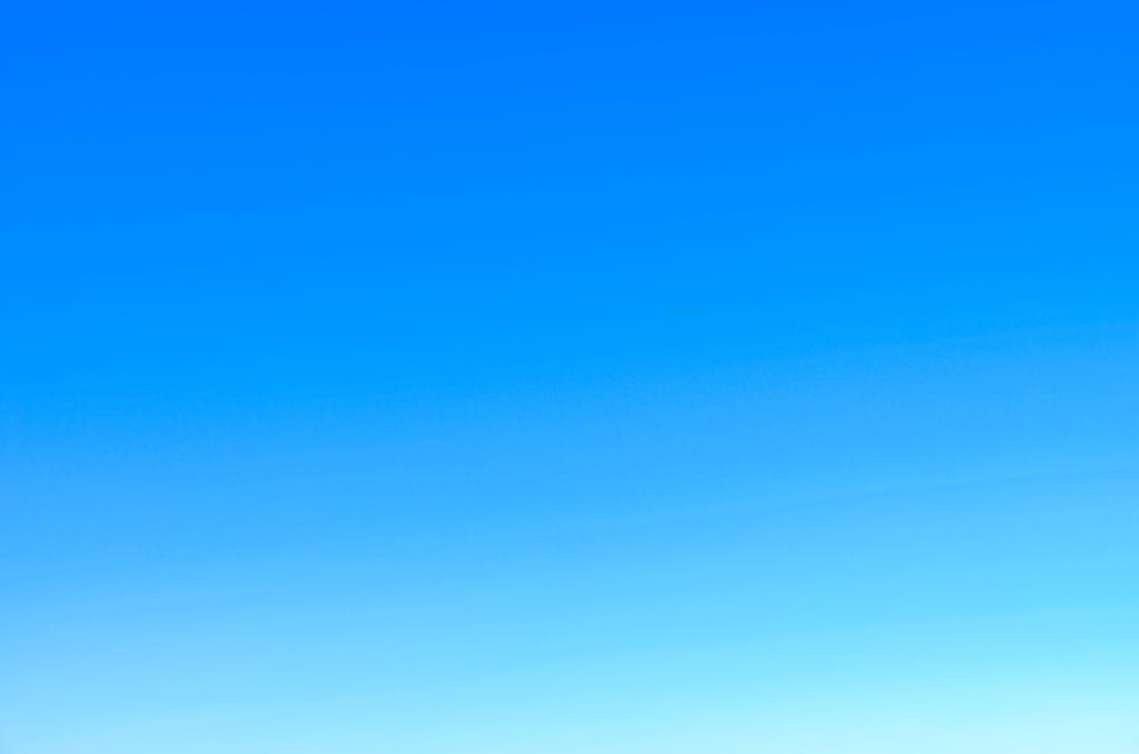 Kongotech.org A serene view of a vibrant clear blue sky with a subtle gradient, perfect for backgrounds.