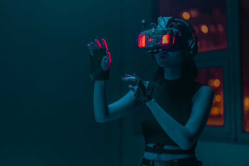 whatsontech Woman exploring virtual reality with neon lights in a dark studio setting.